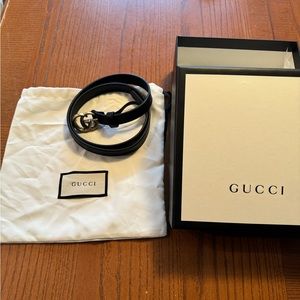 Black Gucci belt